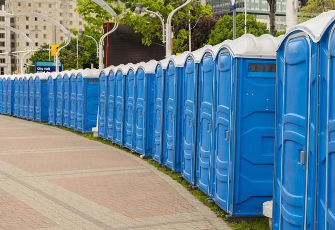 a row of portable restrooms at a fairground, offering visitors a clean and hassle-free experience in Golden Valley